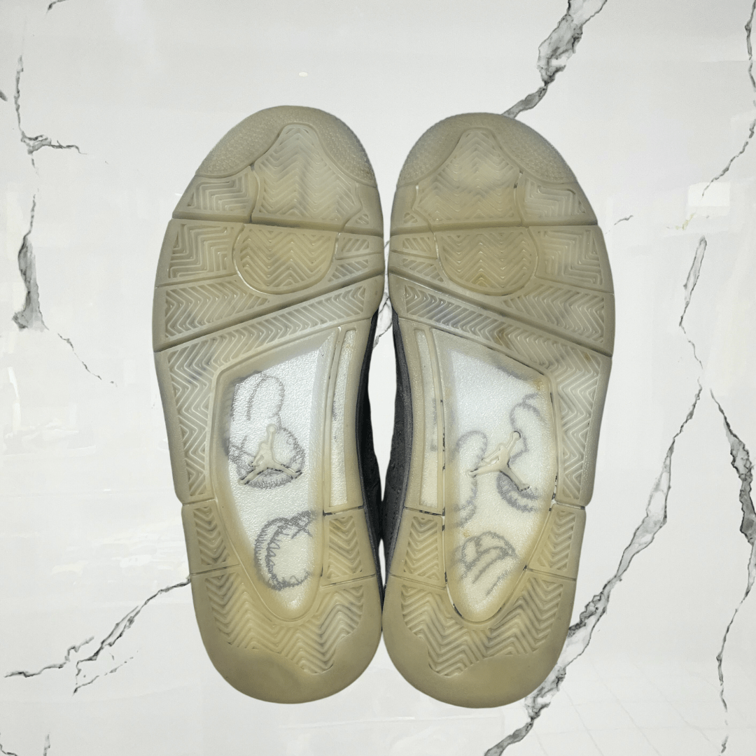 Jordan 4 Kaws Grey (De Uso) - Urban Utility