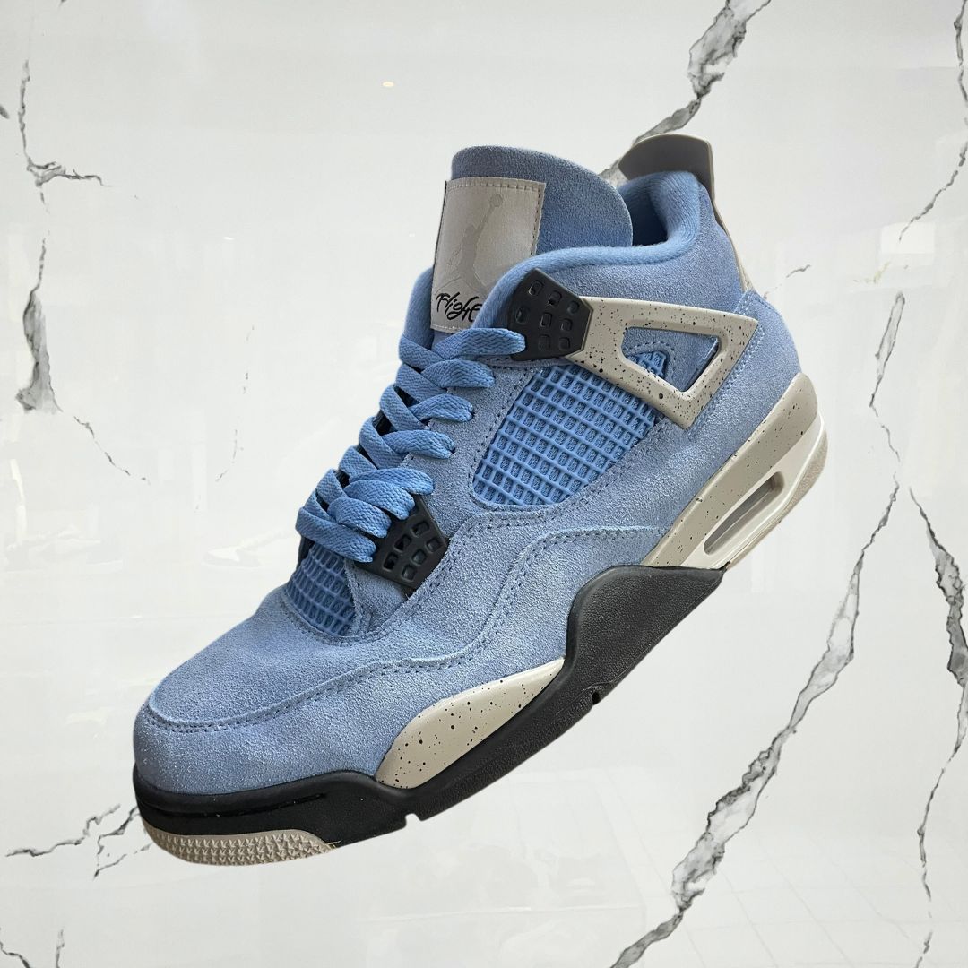 Jordan 4 University Blue (De Uso)
