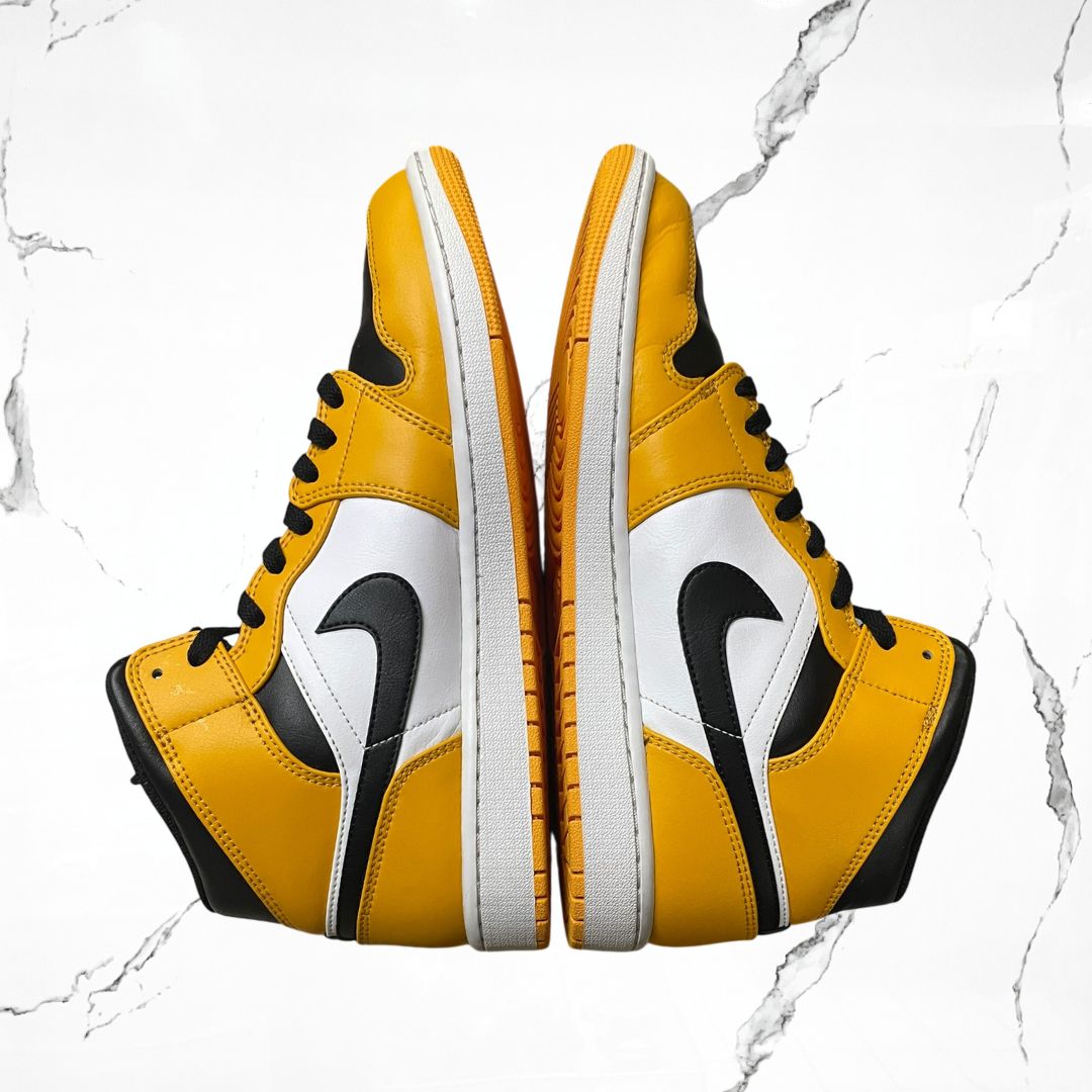 Jordan 1 Mid Taxi (De Uso)