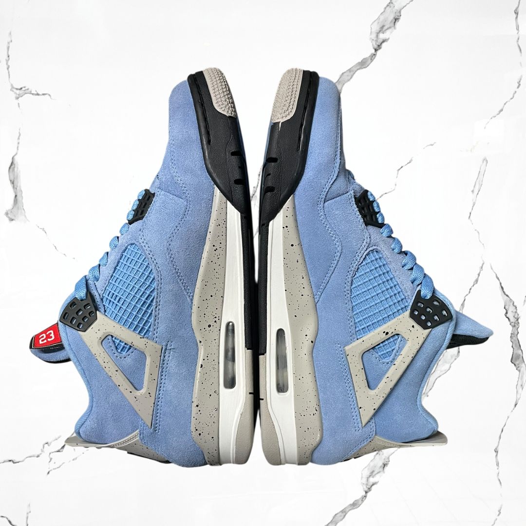 Jordan 4 University Blue (De Uso)