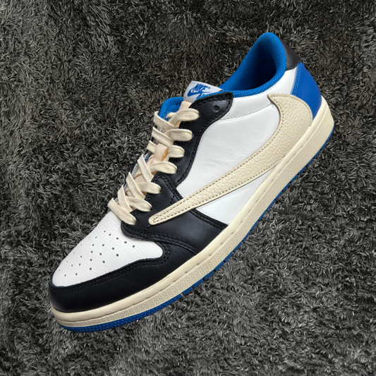 Jordan 1 Low	Travis Scott Fragment (De Uso)