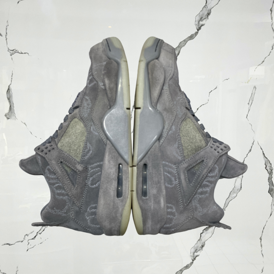 Jordan 4	Kaws Grey (De Uso)