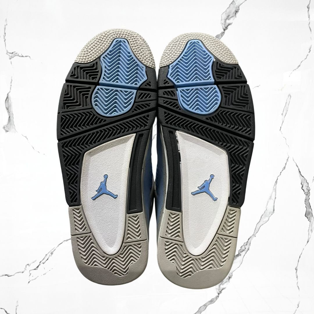 Jordan 4	University Blue (De Uso)