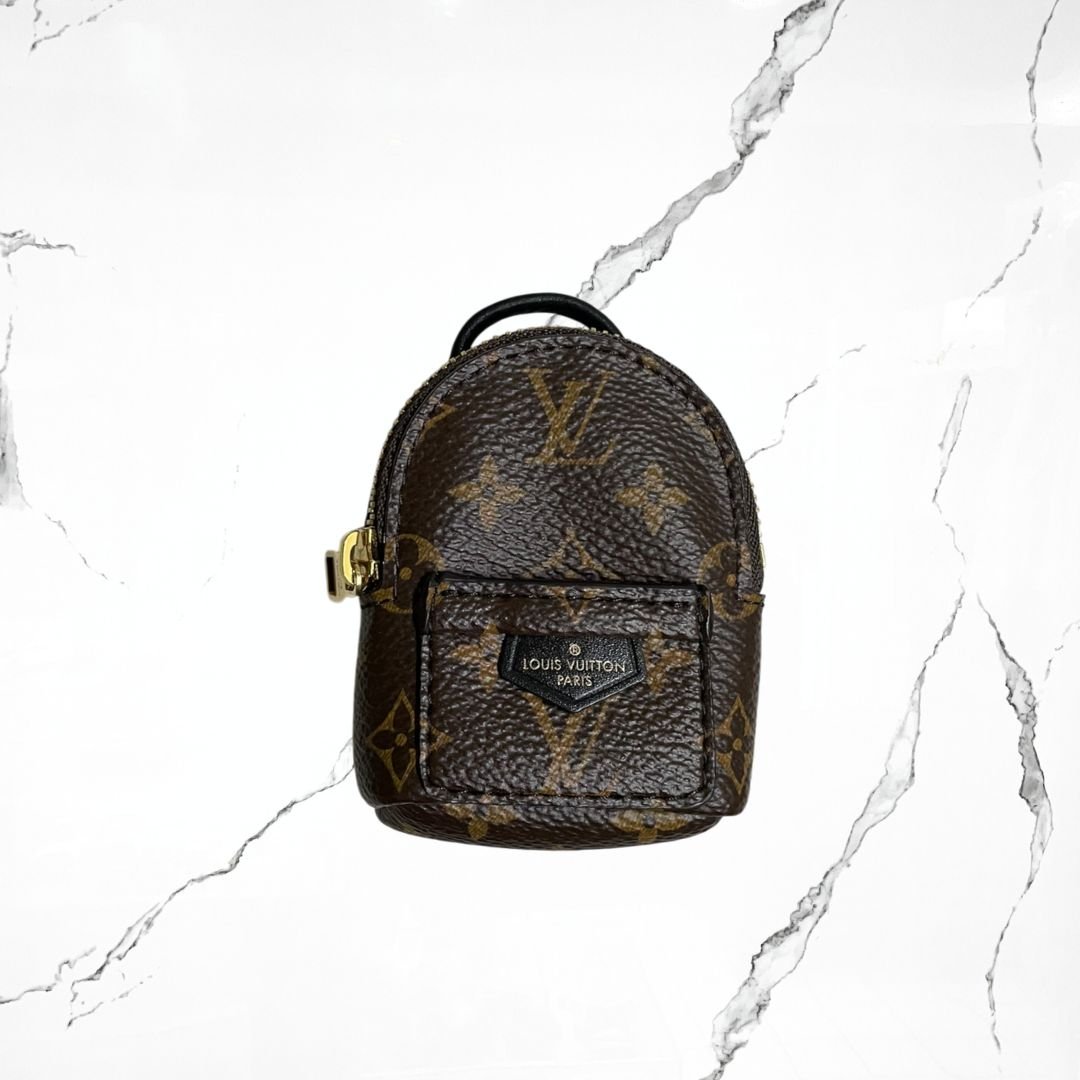 Louis Vuitton Monogram Brown Charm Bagpack - Urban Utility