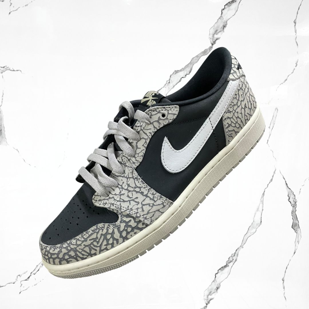 Jordan 1 Retro Low OG Black Cement (De Uso)